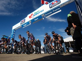 The Lupus Racing Team takes off for the first stage of the 2015 Tour of Alberta on Wednesday in Grande Prairie. (Tom Bateman, Postmedia Network)