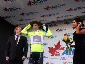 Bauke Mollema dons the yellow leader's jersey Wednesday after the completion of the Stage 1 Team Time Trial of the Tour of Alberta. (Tom Bateman, Postmedia Network)