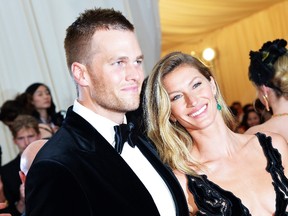 Tom Brady and Gisele Bundchen attend the "Charles James: Beyond Fashion" Costume Institute Gala at the Metropolitan Museum of Art on May 5, 2014 in New York City.   (Mike Coppola/Getty Images/AFP)