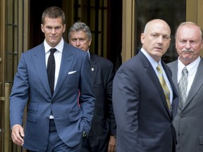 New England Patriots quarterback Tom Brady exits the Manhattan Federal Courthouse in New York, August 31, 2015. REUTERS/Brendan McDermid