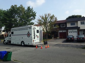 Police at the scene on Memory Lane in Pickering Thursday, Sept. 3 after a man was found dead Tuesday. (Jenny Yuen/Toronto Sun)