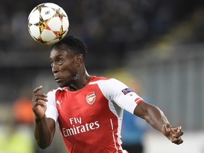 Arsenal's English forward Danny Welbeck heads the ball during a UEFA Champions League group stage match against Anderlecht at the Constant Vanden Stock stadium in Anderlecht on October 22, 2014. (AFP PHOTO/JOHN THYS)