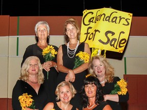 Cast members from the Kinsmen Club of Kingston production Calendar Girls pose for a photo before rehearsal at the Grand Theatre. The show opens Sept 9. (Julia McKay/The Whig-Standard)
