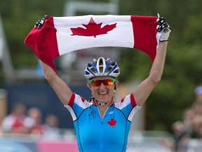 Canada's Catharine Pendrel races to the gold medal in the women's cross-country event at the Commonwealth Games in Glasgow, Scotland on Tuesday, July 29, 2014. (THE CANADIAN PRESS/Andrew Vaughan)