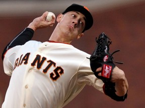 San Francisco Giants starting pitcher Tim Lincecum (55) throws to the os Angeles Dodgers in the first inning of their MLB baseball game at AT&T Park. Mandatory Credit: Lance Iversen-USA TODAY Sports