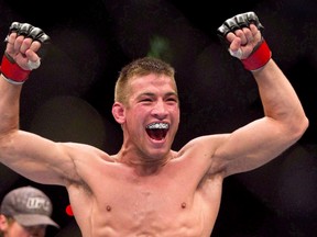 Sam Stout of London, Ont., celebrates after knocking out Yves Edwards in the first round during their lightweight bout at UFC 131 in Vancouver on June 11, 2011. (THE CANADIAN PRESS/Darryl Dyck)