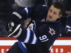 Winnipeg Jets centre Jiri Tlusty, seen during the warmup prior to playing the Los Angeles Kings in Winnipeg, March 1, 2015, is still looking for a job for the coming NHL season. (Postmedia Network file photo)
