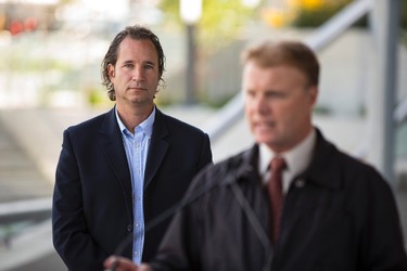 City of Edmonton Transportation Services Communications Manager Graeme McElheran (right) speaks as Transportation Services General Manager Dorian Wandzura (left) looks on during a media tour of the new Metro LRT line in Edmonton, Alta., on Thursday September 3, 2015. The LRT extension will open on Sunday, Sept. 6 cost a total of $665 million to build and connects Churchill Station to NAIT. Ian Kucerak/Edmonton Sun/Postmedia Network