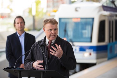 City of Edmonton Transportation Services Communications Manager Graeme McElheran (right) speaks as Transportation Services General Manager Dorian Wandzura (left) looks on during a media tour of the new Metro LRT line in Edmonton, Alta., on Thursday September 3, 2015. The LRT extension will open on Sunday, Sept. 6 cost a total of $665 million to build and connects Churchill Station to NAIT. Ian Kucerak/Edmonton Sun/Postmedia Network