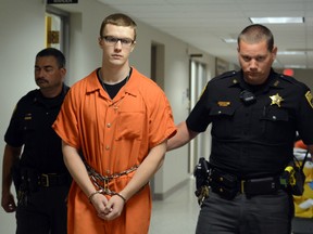 Dylan Lahr is escorted to the courtroom from the Union County jail inside the Union courthouse for his sentencing hearing on Thursday, Sept. 3, 2015, in Lewisburg, Pa. Lahr is one of three young men convicted in a July 2014 rock-throwing incident that caused severe brain trauma to an Ohio schoolteacher as she passed through Pennsylvania in the dead of night. (Amanda August/The Daily Item via AP)