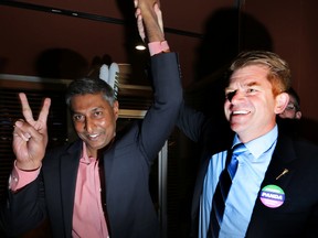 Prasad Panda (left) and Wildrose party leader Brian Jean celebrate with their team after winning the Calgary-Foothills bye-election at the Crowfoot Boston Pizza in NW Calgary, Alta. on Thursday September 3, 2015. Stuart Dryden/Calgary Sun/Postmedia Network