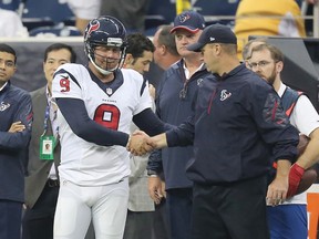 Houston Texans coach Bill O'Brien is congratulated by punter Shane Lechler (9) after a win over the Washington Redskins on September 7, 2014 at NRG Stadium in Houston. (Thomas B. Shea/Getty Images/AFP)
