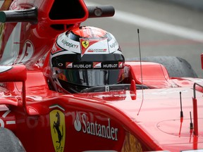 Ferrari driver Kimi Raikkonen steers his car during the second free practice at the Monza racetrack in Italy Friday, Sept. 4 , 2015. (AP Photo/Alessandro Trovati)