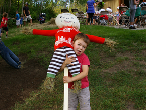This little guy struggled to carry his completed scarecrow during a recent Fall Family Festival at the Devonian Botanic Gardens in Parkland County. This year’s event will be held on Sept. 13 - Photo supplied