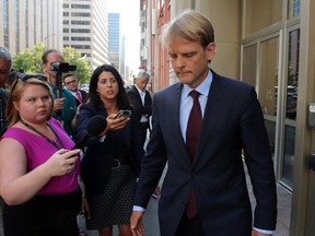 Immigration Minister Chris Alexander talks to reporters after a television interview in Ottawa on Thursday, September 3, 2015, in the wake of images of a Syrian child found drowned on the shores of Turkey. THE CANADIAN PRESS/Fred Chartrand