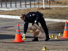 Police on scene of a suspicious death in a parking lot on Stony Plain Road and 160 st in Edmonton, Alberta on Tuesday, April 22, 2014.  Perry Mah/ Edmonton Sun/ QMI Agency