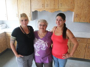 Liana Russworm, Ruth Leitch and Elisa Nesdoly-Cartwright are pictured here in a kitchen they hope to restore at the Brooke-Alvinston town hall on Friday September 4, 2015 in Alvinston, Ont. The trio recently formed the Brooke-Alvinston Arts & Activity Group to offer a variety of programming for the community. Barbara Simpson/Sarnia Observer/Postmedia Network