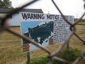A sign warns visitors to the former army camp at the Chippewas of Kettle and Stony Point First Nation of unexploded ordnance in parts of the 2,400 acre site in Ipperwash. (Free Press file photo)