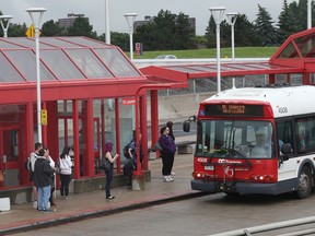 OC Transpo management is taking steps to limit spending for the rest of 2015. (Ottawa Sun Files)