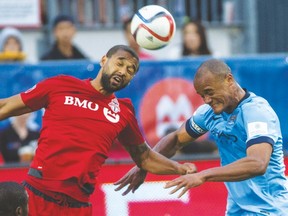 TFC’s Luke Moore (left) could draw into the starting 11 with Sebastian Giovinco and Jozy Altidore missing from tonight’s tilt in Seattle.(CRAIG ROBERTSON, Toronto Sun)