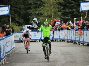 Tom jelte Slagter of Team Cannondale-Garmin raises his arms as he crosses the Stage 3 finish line of the Tour of Alberta at the Miette hot springs in Jasper National Park. (Chris Funston, Postmedia Network)