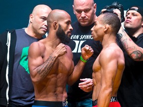 Demetrious Johnson (left) and opponent John Dodson face off during UFC 191 weigh ins at the MGM Grand Casino in Las Vegas on Friday, Sept. 4, 2015. (L.E. Baskow/Las Vegas Sun via AP)