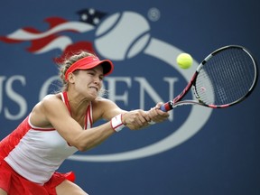 Eugenie Bouchard hits a return to Dominika Cibulkova during their match at the U.S. Open in New York, September 4, 2015. (REUTERS/Mike Segar)