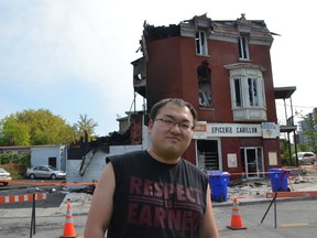 Yifan Li stands in front of his former place of business on Saturday Sept. 5, 2015