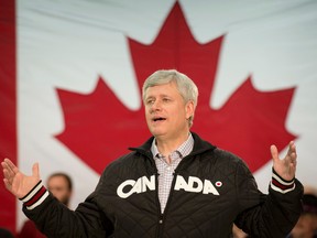 Conservative Leader Stephen Harper gestures during a campaign event in Whitehorse, Y.T., on Friday, September 4, 2015. THE CANADIAN PRESS/Adrian Wyld