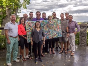 There was huge support shown at the 5th Annual Ronald McDonald House Northern Alberta Charity Golf Classic last week - the folks in this photo each donated $1,000 to help kids like Elise Kwan (front), whose family stayed at RMHNA almost two full years while she was receiving treatment at the Stollery. (SUPPLIED)