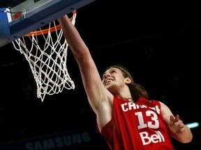 Canada's Kelly Olynyk leaps to the basket to score against Puerto Rico during their 2015 FIBA Americas Championship basketball game, at the Sport Palace in Mexico City September 4, 2015. (REUTERS/Henry Romero)
