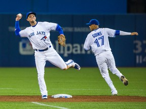 Jays shortstop Troy Tulowitzki, making one of his tradmark cross-body throws to first, has, according to one scout, won games for his team on defence alone. 9ERNEST DOROSZUK, Toronto Sun)