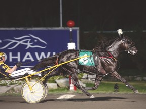 Control The Moment, driven by Randall Waples, wins the $685,000 Metro Pace at Mohawk Racetrack on Saturday night. (Clive Cohen/New Image Media)