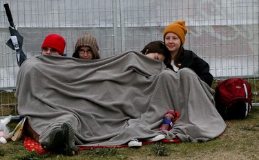 Fans try to stay warm at the 2015 SONiC BOOM Festival in Borden Park in Edmonton on Saturday Sept. 5, 2015. Tom Braid/Edmonton Sun/Postmedia Network.