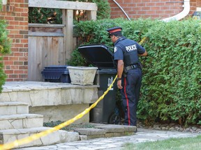 Toronto Police investigate on Sandcliffe Rd., in the Jane St. and Eglinton Ave. area, after a man was stabbed to death in Noble Park early Sunday September 6, 2015. (Dave Thomas/Toronto Sun)
