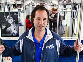 Edmonton's general manager of transportation Dorian Wandzura rides the Metro Line as the LRT Metro Line opens in Edmonton, Alta. on Sunday, Sept. 6, 2015. Codie McLachlan/Edmonton Sun/Postmedia Network