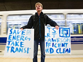 LRT fan Ryan Wolfert, 20, is seen at the Churchill LRT Station as the LRT Metro Line opens in Edmonton, Alta. on Sunday, Sept. 6, 2015. Codie McLachlan/Edmonton Sun/Postmedia Network