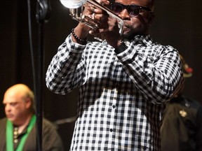 Travis "Trumpet Black" Hill performs at The Carver Theater on January 30, 2015 in New Orleans, Louisiana. Theodore Emile "Bo" Dollis, Big Chief of the Wild Magnolias, passed away on January 20, 2015.  Erika Goldring/Getty Images/AFP