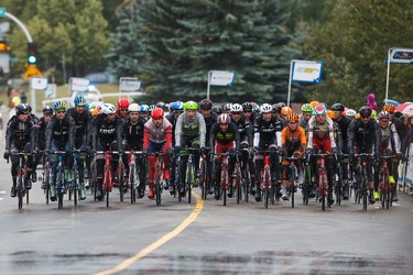The peloton is seen crossing the finish line of Stage 5 of the Tour of Alberta, which ran from Edson to Spruce Grove, in Spruce Grove, Alta., on Sunday September 6, 2015. The race finishes in Edmonton on Sept. 7. Ian Kucerak/Edmonton Sun/Postmedia Network
