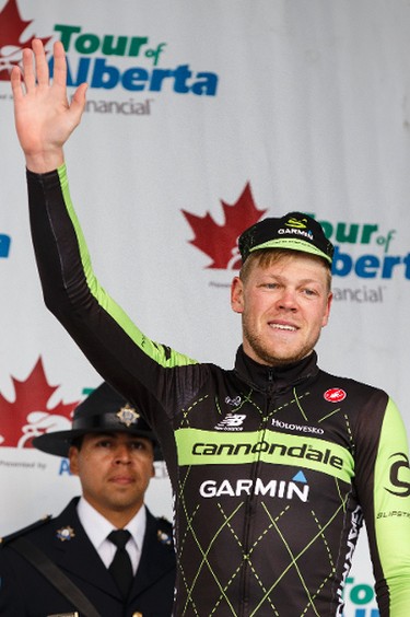 Stage winner Lasse-Norman Hansen with Cannondale-Garmin celebrates during the stage presentation at the end of Stage 5 of the Tour of Alberta, which ran from Edson to Spruce Grove, in Spruce Grove, Alta., on Sunday September 6, 2015. The race finishes in Edmonton on Sept. 7. Ian Kucerak/Edmonton Sun/Postmedia Network