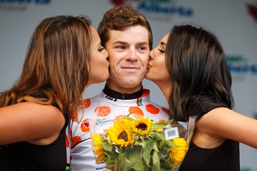 Mountain jersey winner Benjamin Perry with Silber Pro Cycling celebrates during the stage presentation at the end of Stage 5 of the Tour of Alberta, which ran from Edson to Spruce Grove, in Spruce Grove, Alta., on Sunday September 6, 2015. The race finishes in Edmonton on Sept. 7. Ian Kucerak/Edmonton Sun/Postmedia Network