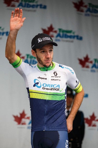 Best Young Rider Adam Yates with Orica-Greenedge celebrates during the stage presentation at the end of Stage 5 of the Tour of Alberta, which ran from Edson to Spruce Grove, in Spruce Grove, Alta., on Sunday September 6, 2015. The race finishes in Edmonton on Sept. 7. Ian Kucerak/Edmonton Sun/Postmedia Network