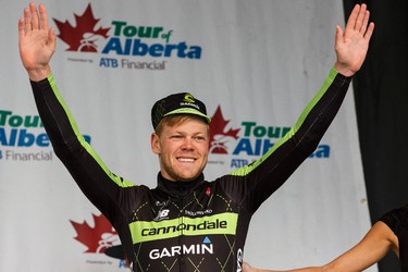 Winner Lasse-Norman Hansen celebrates his win during the stage presentation at the end of Stage 5 of the Tour of Alberta, which ran from Edson to Spruce Grove, in Spruce Grove, Alta., on Sunday September 6, 2015. The race finishes in Edmonton on Sept. 7. Ian Kucerak/Edmonton Sun/Postmedia Network