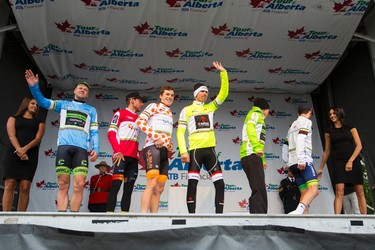 (Left to right) Racers Lasse Norman Hansen, Michael Woods, Benjamin Perry, Bauke Mollema, Tom Jelte Slagter and Adam Yates are seen at the conclusion of the stage presentation at the end of Stage 5 of the Tour of Alberta, which ran from Edson to Spruce Grove, in Spruce Grove, Alta., on Sunday September 6, 2015. The race finishes in Edmonton on Sept. 7. Ian Kucerak/Edmonton Sun/Postmedia Network