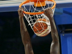 Canada's Anthony Bennett leaps to the basket to score against Panama during their 2015 FIBA Americas Championship basketball game in Mexico City on Sunday. (REUTERS/Henry Romero)