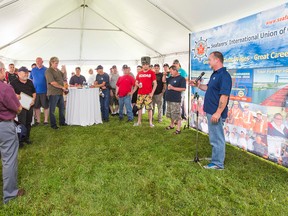 Seafarers International Union of Canada president James Given, seen here welcoming local members in St. Catherines for a BBQ on June 25 2014, says the government of Canada is letting foreign workers take jobs from qualified Canadians. Bob Tymczyszyn/Postmedia Network