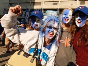 Jack Boland/Postmedia Network
Toronto Blue Jays fans celebrate before a game in this file photo. More than half of Star readers who responded to a poll think the Jays will win the World Series this year.