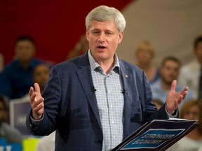 Conservative Leader Stephen Harper speaks to supporters at a campaign rally in Toronto on Monday, September 7, 2015. THE CANADIAN PRESS/Adrian Wyld