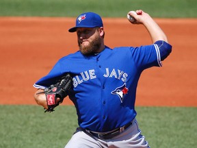 Toronto Blue Jays starting pitcher Mark Buehrle delivers against the Boston Red Sox during the first inning of his team's baseball game at Fenway Park in Boston on Sept. 7, 2015. (WINSLOW TOWNSON/AP)
