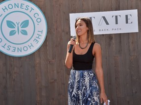 The Honest Company's Jessica Alba gets the kids excited at The Honest Company + STATE back to school event on August 17, 2015 in Arleta, California.  Charley Gallay/AFP